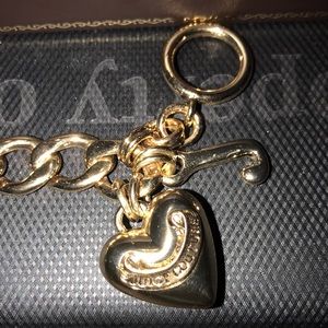 Juicy Couture gold tone charm bracelet